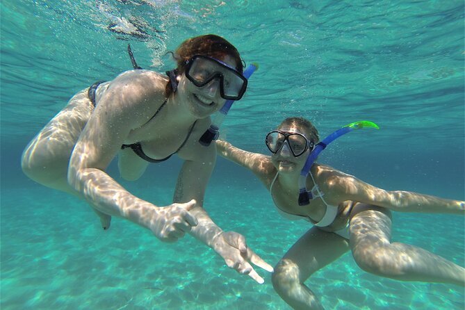 Ibiza Snorkeling Beach and Cave Tour - On Board: Drinks, Music, and Crew Energy