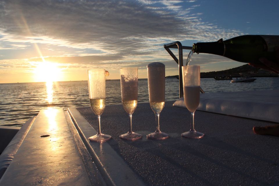 Ibiza: Snorkeling, Sunset Beach and Cave Boat Trip - Paddleboarding: fun on calm water, not a test of fitness