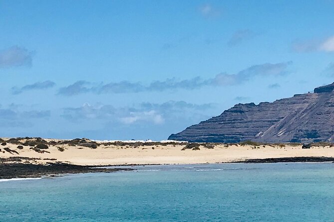 La Graciosa at your leisure (bus transfer and return ferry ticket) - Five Hours on La Graciosa: Beaches, Caleta de Sebo, and Sand-Road Walking