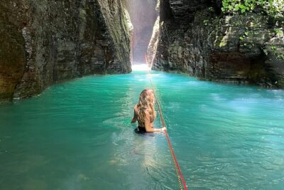 La Leona Waterfall - The river-canyon hike: forest walking, rocky caves, and crossings