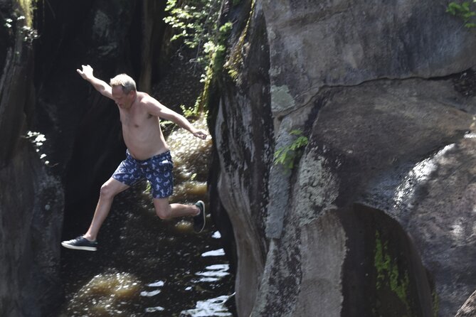 La Leona waterfall Cliffjumping White water Tubbing PrivateTour - Stop 2 at La Leona: ladders, ropes, caves, and a short swim