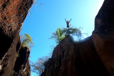 La Leona waterfall Cliffjumping White water Tubbing PrivateTour - Stop 1 in Curubandé: cliff jumping with 25- to 45-foot choices