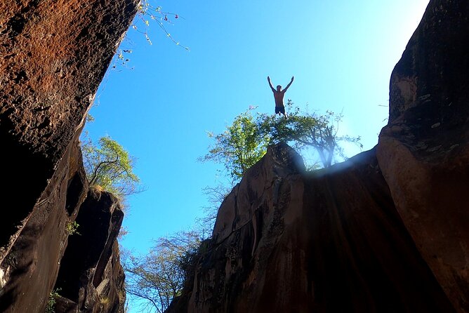 La Leona waterfall Cliffjumping White water Tubbing PrivateTour - Stop 1 in Curubandé: cliff jumping with 25- to 45-foot choices