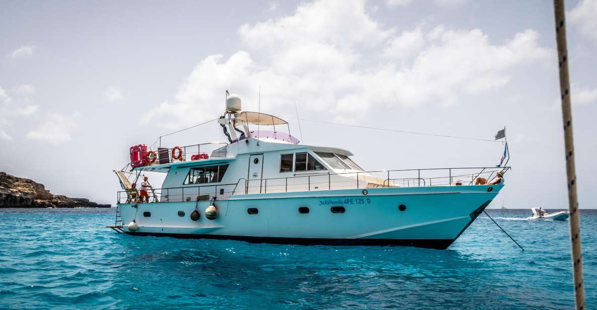 Lampedusa: Yacht excursion, swimming stops and typical lunch - East Coast Features: Mare Morto and Cala Creta