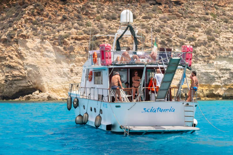 Lampedusa: Yacht excursion, swimming stops and typical lunch - A Lampedusa Yacht Day That Moves With the Sea