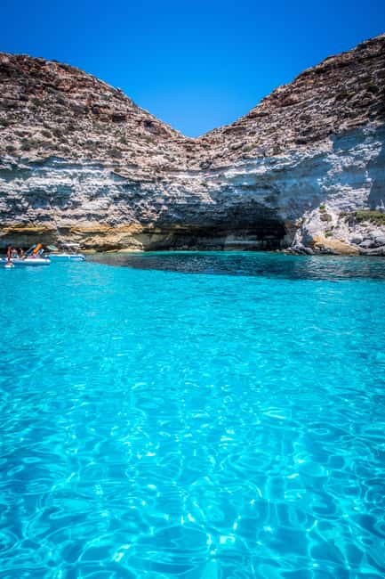 Lampedusa: Yacht excursion, swimming stops and typical lunch - Punta Muro Vecchio: North Coast Sapphire Water