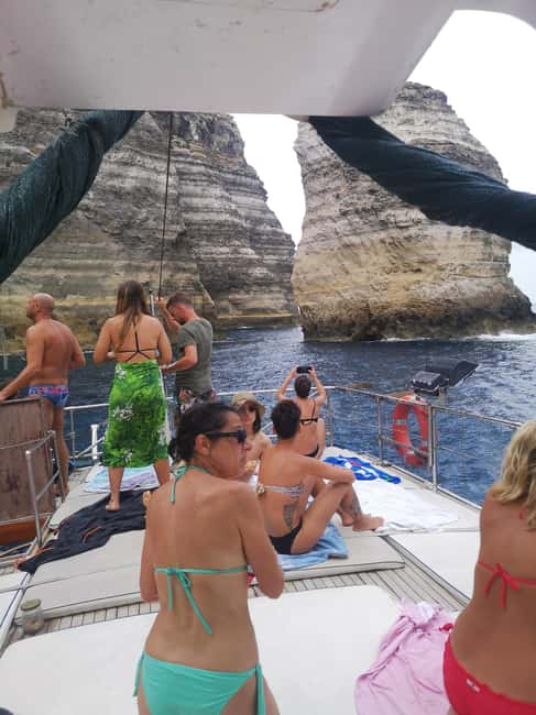 Lampedusa: Yacht excursion, swimming stops and typical lunch - Caves Up Close: Visiting Some by Boat and Others by Snorkeling
