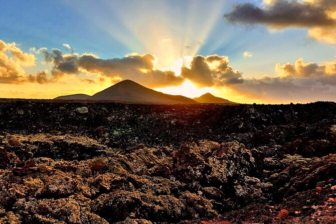 Lanzarote E-Bike Tour: Volcano Craters & Scenic Vineyards - The volcano climb component: walking breaks that turn into payoff