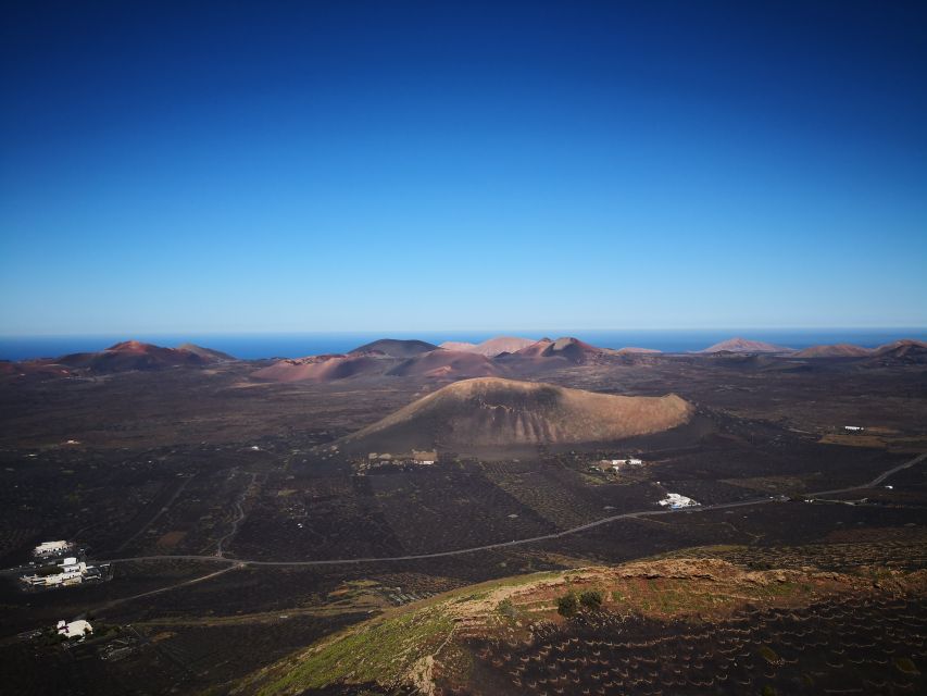 Lanzarote: La Geria Vineyards Hiking Tour - The 9-kilometer hike: vineyards, volcanic footing, and the island high point