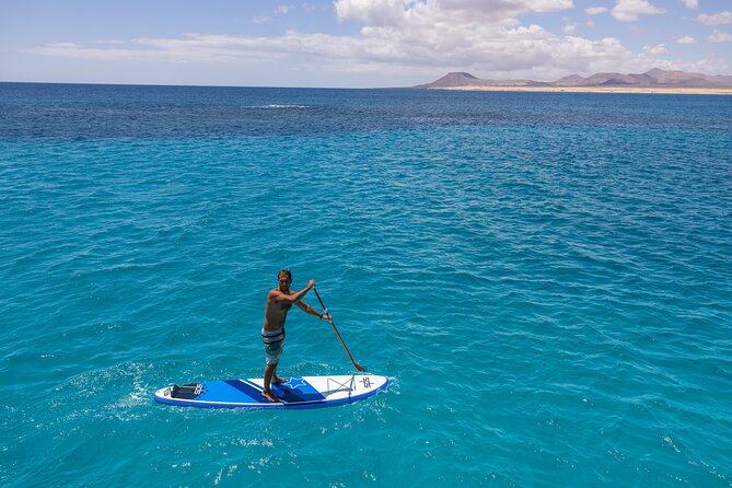 Lobos Island Half-Day Sailing Tour with Lunch - The Playa de la Concha swim stop: snorkel, kayak, and paddleboard time