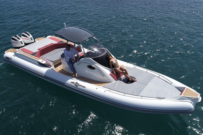 Luxury Boat Private Tour to Favignana and Levanzo in Sicily - Levanzo: passing the port and Cala Dogana views