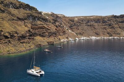 Luxury Santorini Sunset Cruise: Dinner, BBQ, Open Bar, Transfers - From Vlychada Marina to the Red and White Beach sailing views