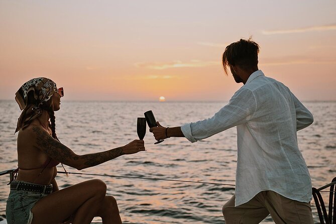 Luxury Santorini Sunset Cruise: Dinner, BBQ, Open Bar, Transfers - Dinner, BBQ, and open bar during the sunset return