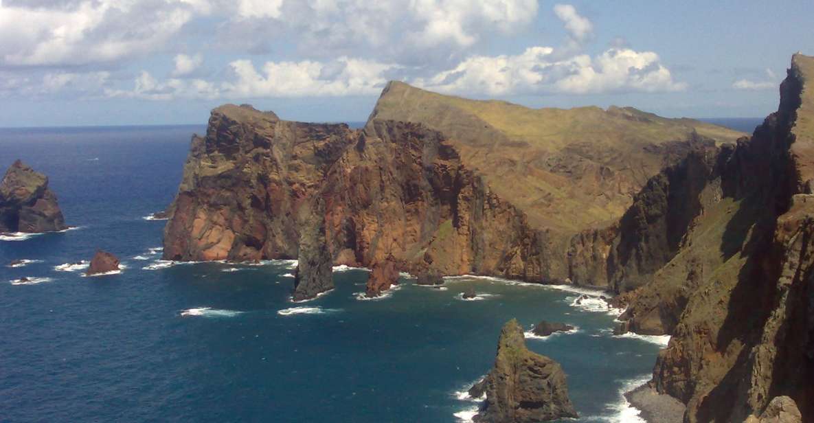 Madeira: Pico do Arieiro & Laurissilva Forest - East tour - Santana’s A-frame houses and the Guindaste north-coast viewpoint