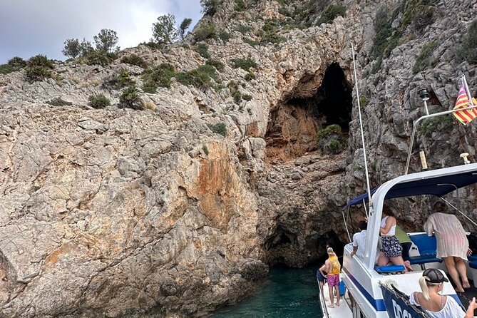 Mallorca Beach & Caves 4hr Boat Trip Drinks, Tapas, SUP & Snorkel - Cruising past the caves: the scenic bonus between water stops