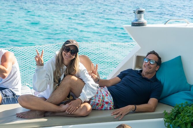 Mallorca Catamaran Small Group Cruise with Tapas 4-hours - Where you might swim: coast vibes and celebrity-adjacent stories