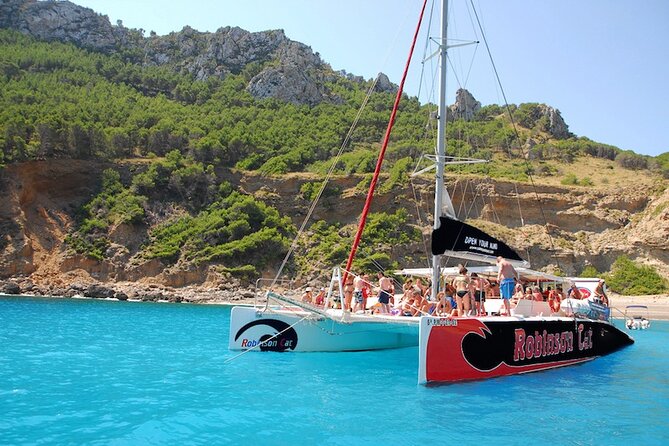 Mallorca Catamaran Tour in the Bay of Pollensa - Snorkeling and stand-up paddleboards: how to use the included gear