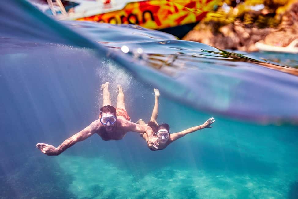 Mallorca: Caves, Cliffs, and Coves Boat Trip - Crew and Guide Energy: More Than Just a Driver