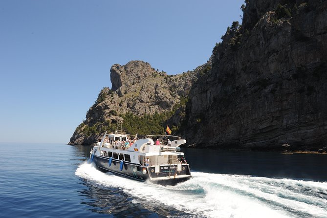 Mallorca in One Day Sightseeing Tour with Boat Ride and Vintage Train - Sa Calobra stop: beach time, cave-tunnel walk, and snack reality
