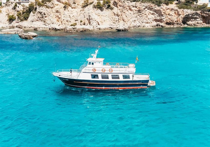 Mallorca: Palma Boat Tour & Snorkeling with Drink Included - The swim and snorkel stop: crystal water in a protected reserve