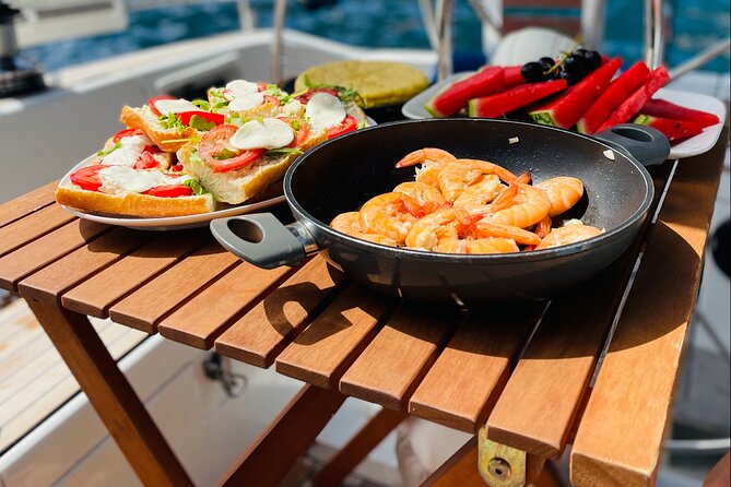 Mallorca sailing tour with tapas and wine - Dolphin Chances and the Fun Bonus of Steering the Yacht