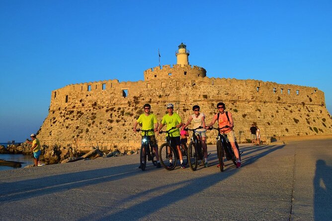 Mediaeval Rhodes E-bike Highlights Photo Tour Morning/Sunset - Clock Tower to Elli Beach: coastal sights and the aquarium building