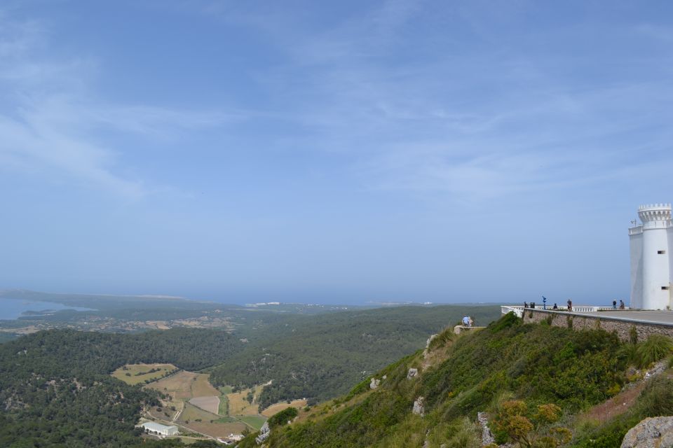 Menorca: Full-Day Island Tour with Guide - Hotel Pickup to the Coach Ride: How the Pace Feels