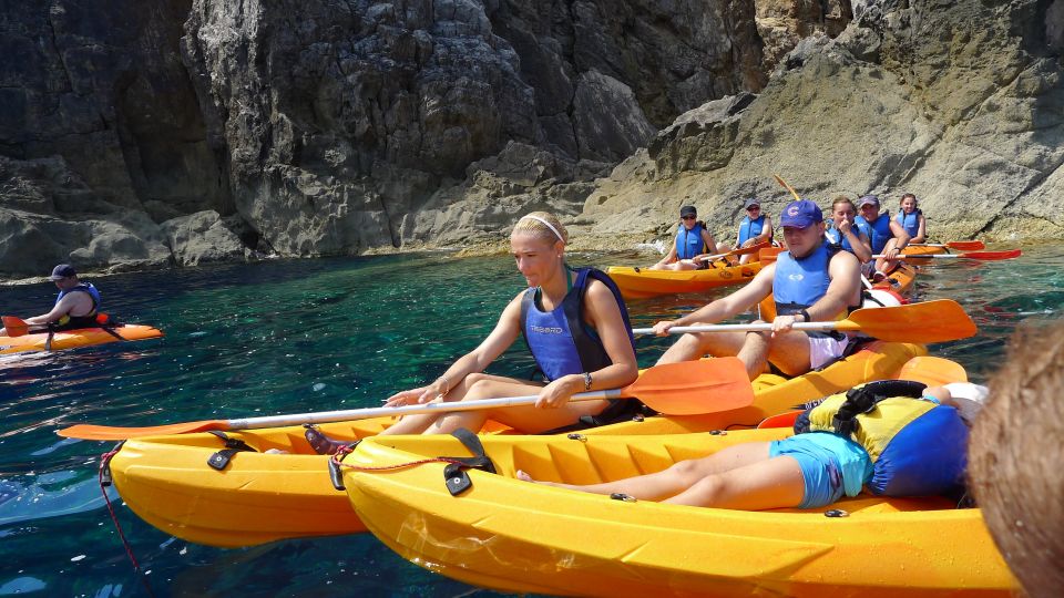 Menorca: Kayak and Marine Reserve Snorkeling Adventure - Kayaking the La Mola de Fornells cliffs: the view is the point