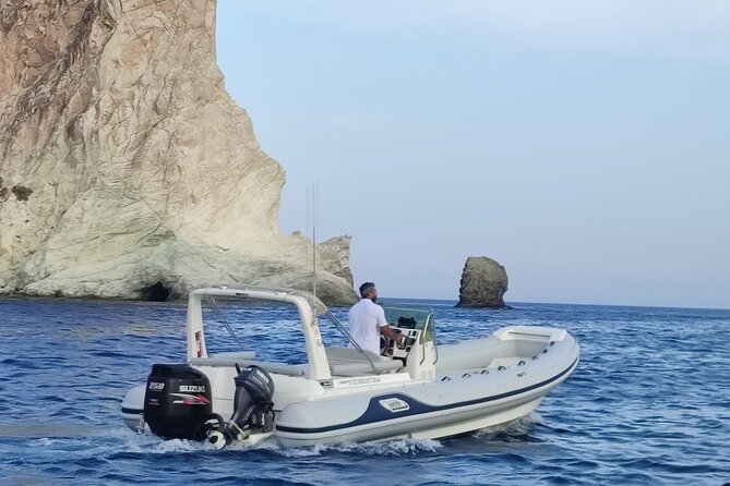 Morning or Afternoon 3hour Private boat Tour in Santorini - The first stop is the whole point: caldera views plus swimming time