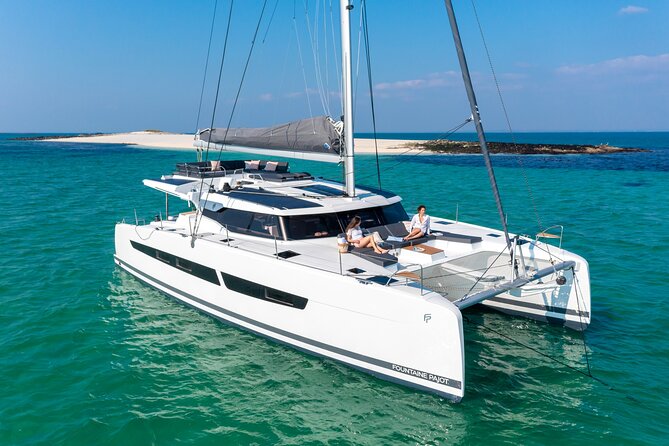Mykonos: Brand-New Catamaran Cruise with Meal, Drinks & Transport - Aerial and White Coral: The Luxury Details You Can Actually Feel
