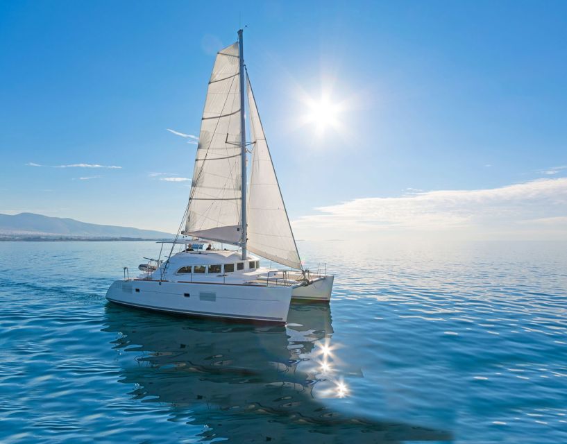 Mykonos: Catamaran Cruise With Meal and Drinks - Hotel pickup to the new port: the easy start