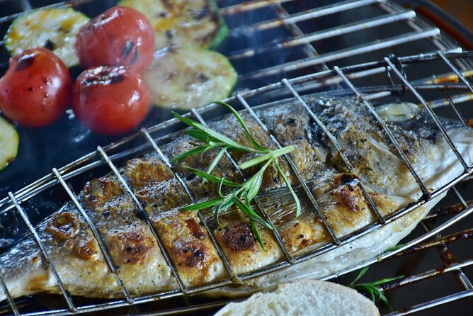 Mykonos: Private Catamaran Cruise—Hotel Pickup, BBQ & Drinks - The BBQ lunch setup: simple, filling, and made for a boat day