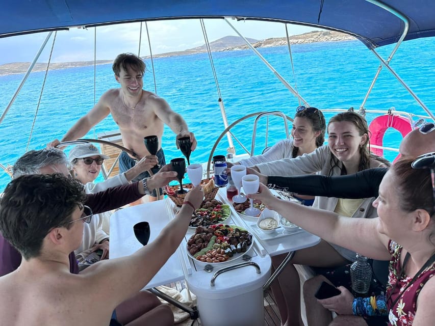 Mykonos: Rhenia Island Sunset Cruise with Transfer and Meal - Pickup and Crew: The Part That Sets the Tone