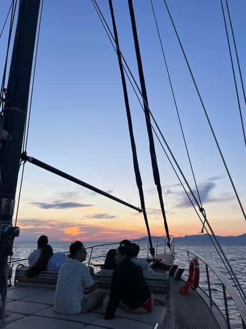 Mykonos: Sunset Boat Cruise with Light Dinner & Drinks - The Boat and On-Board Comfort: Gulets, Group Size, and the Barefoot Rule