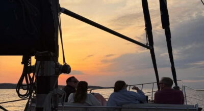 Mykonos: Sunset Boat Cruise with Light Dinner & Drinks - Getting to the Pier: Agios Ioannis Diakoftis and the First Bottleneck