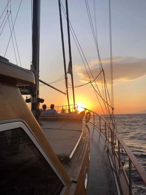 Mykonos: Sunset Boat Cruise with Light Dinner & Drinks - The Route: Iconic Mykonos Bays and What Each Stop Does for the Evening