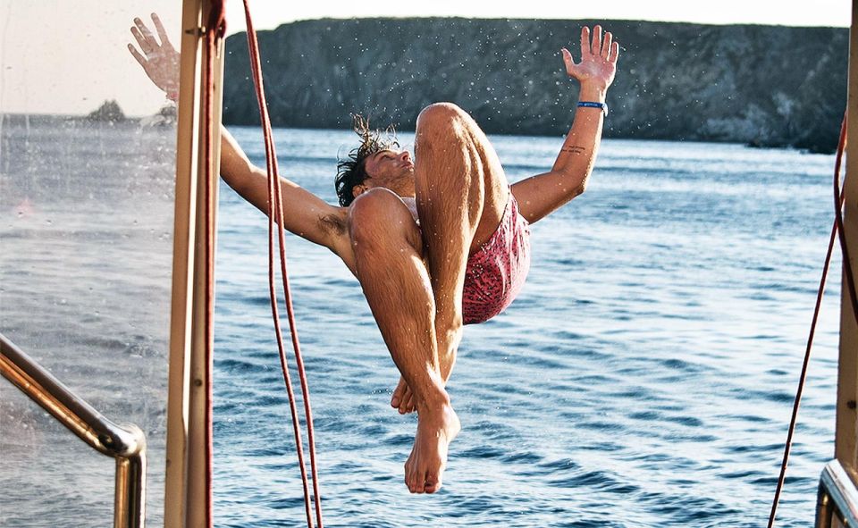 Mykonos: Sunset Boat Party with Open Bar & Live DJ - Getting on Board at Mykonos Old Port (Next to Delos Tours)