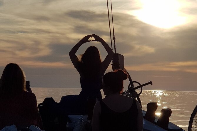 Mykonos: Sunset Cruise with Drinks - Onboard setup: snacks, drinks, and the crew that makes it feel easy