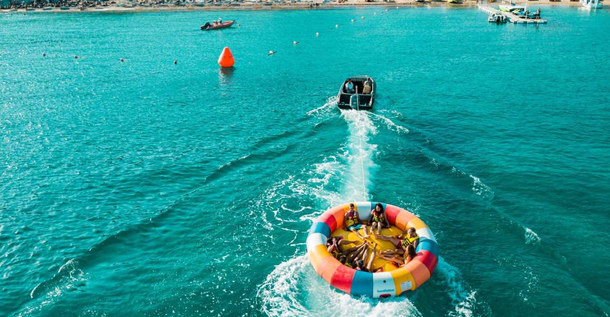 Mykonos: Super Paradise Beach Watersport Activities - The watersport lineup: banana boat, spin ring, crazy sofa, airstream