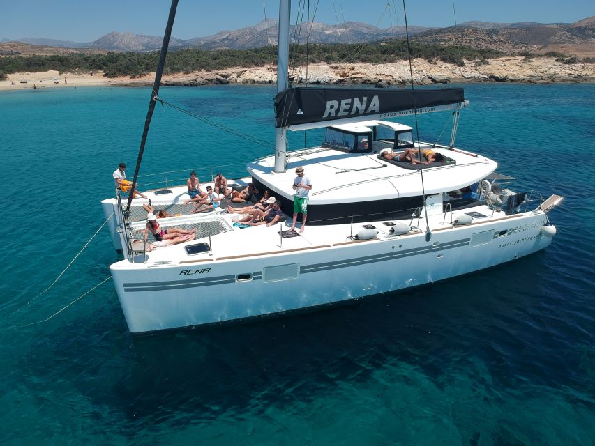 Naxos: Catamaran Cruise with Swim Stops, Food, and Drinks - Lunch on board: local food, vegetarian options, and cold drinks