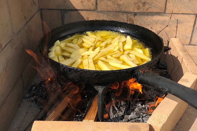 Naxos Perivoli Farm Experience & Wood-fire Cooking Class - Wood-fire cooking class: from chopping stations to a shared feast