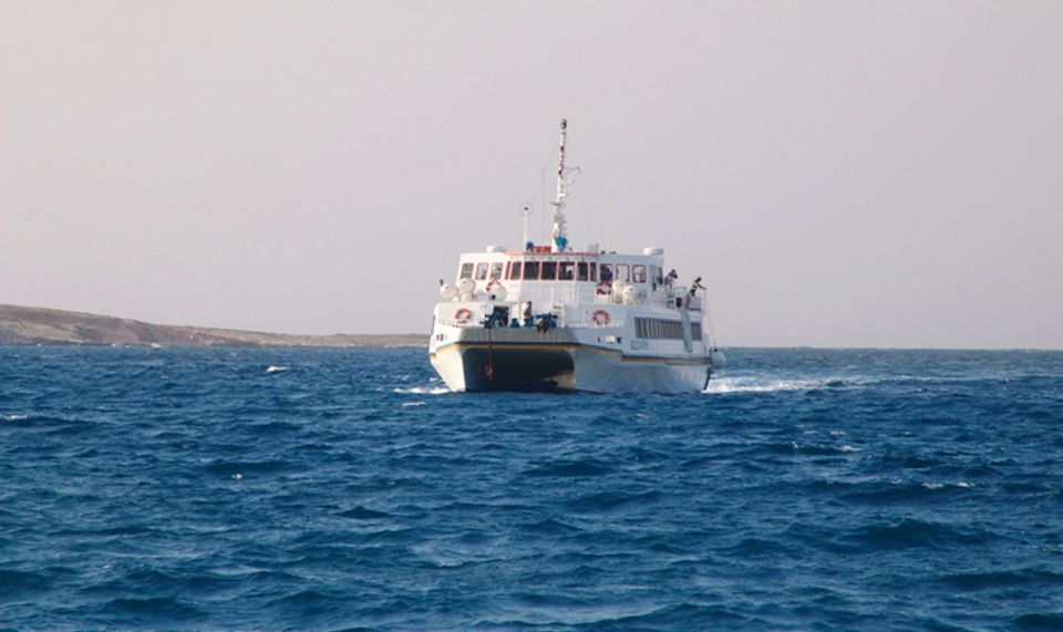 Naxos: Santorini Day Trip by Boat with Guided Tour - Dock, hop on the bus, and get your bearings