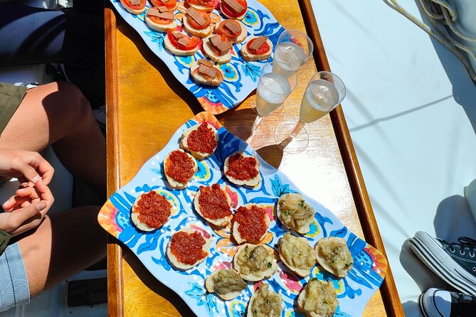 One day excursion on a sailing boat in the Gulf of Alghero - Torre del Lazzaretto: the aperitif stop and last chance to swim