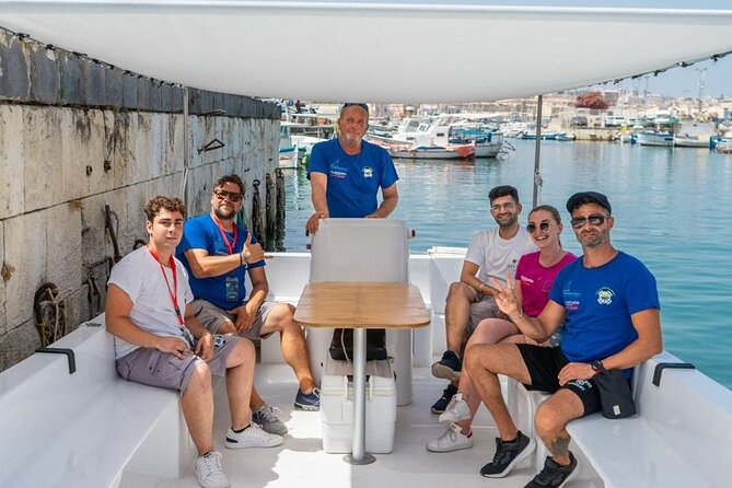 Ortigia Island and Sea Caves Boat Tour with Prosecco - Communication in English: What to Expect Onboard
