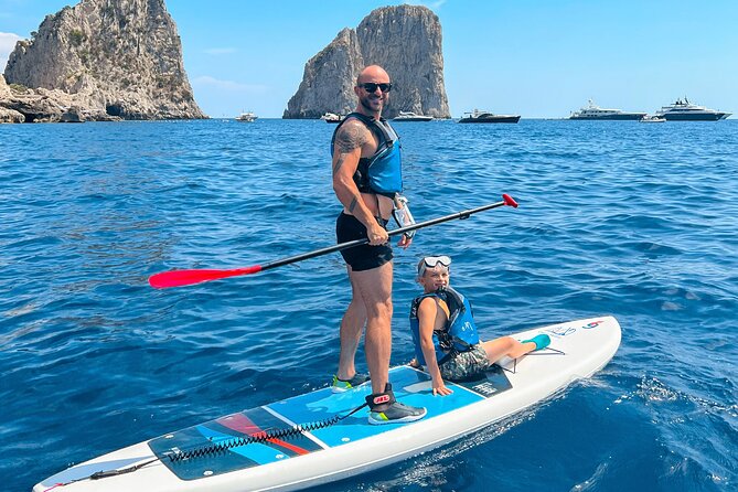 Paddleboard in Capri between caves and beaches. Photos included! - The Small Sea-Level Cave + Faraglioni Photo Moments