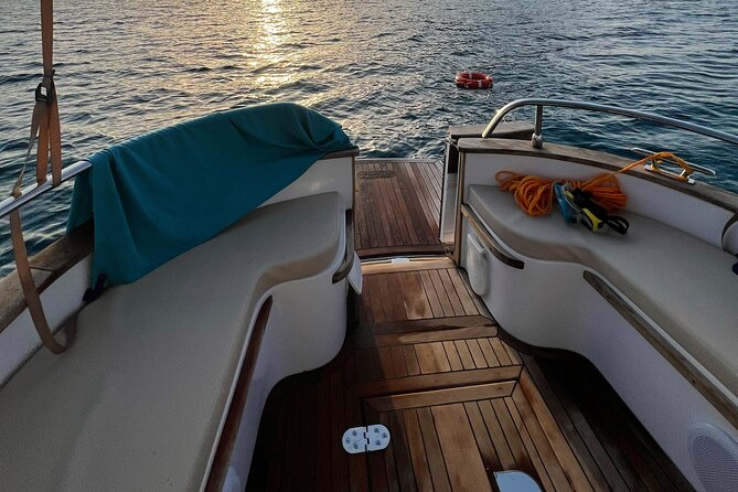 Palermo by Sea: Exclusive Coastal Escape with Aperitif - Small boat, big views: Stefano and Salvo at the helm