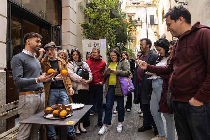 Palermo Street Food & Market Tour by Eating Europe - Arch of Cutò: a 13th-century doorway into the Ballarò maze