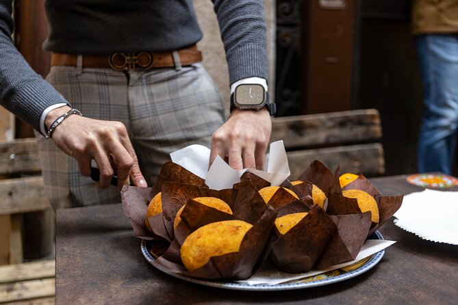 Palermo Street Food & Market Tour by Eating Europe - Babbalù: arancina from an old pharmacy (and yes, it matters how round it is)