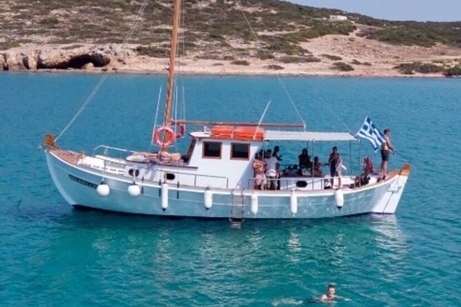 Paros Half Day Boat Tour from Naoussa port and Bay . - What you get onboard: snacks, local wine, and snorkeling gear