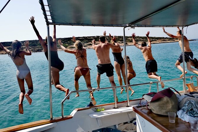 Paros Half Day Boat Tour from Naoussa port and Bay . - Stop 1: Langeri Beach, a quiet sandy cove with shade and nudist swimmers